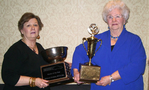 Betty Martin and Virgina Apker receiving trophies at SCCA convention